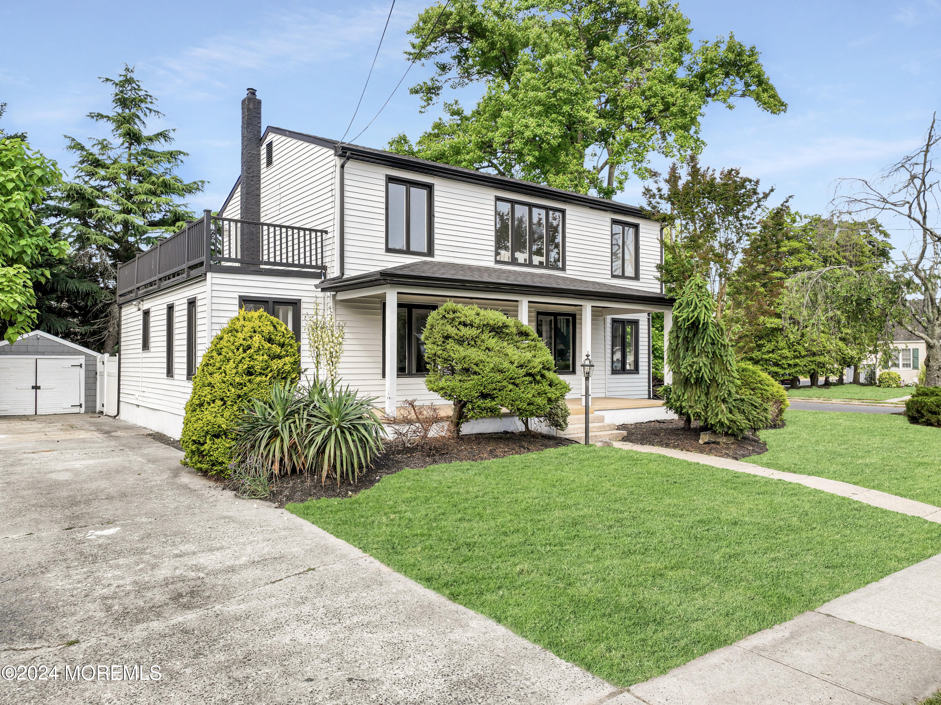 90 Riverview Avenue Neptune, NJ 07753 - Photo 2 of 31 front view of a house with a yard