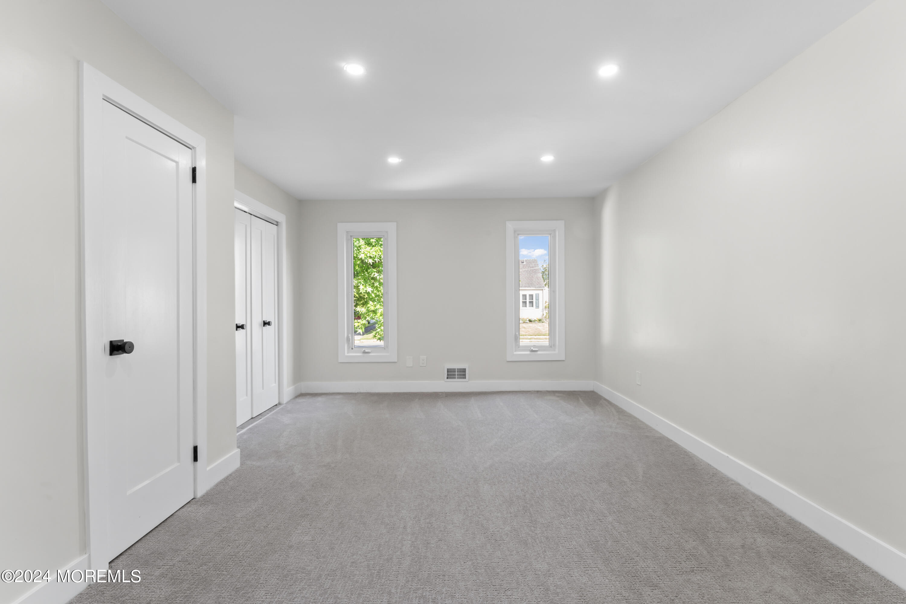90 Riverview Avenue Neptune, NJ 07753 - Photo 23 of 31 a view of an empty room with a window