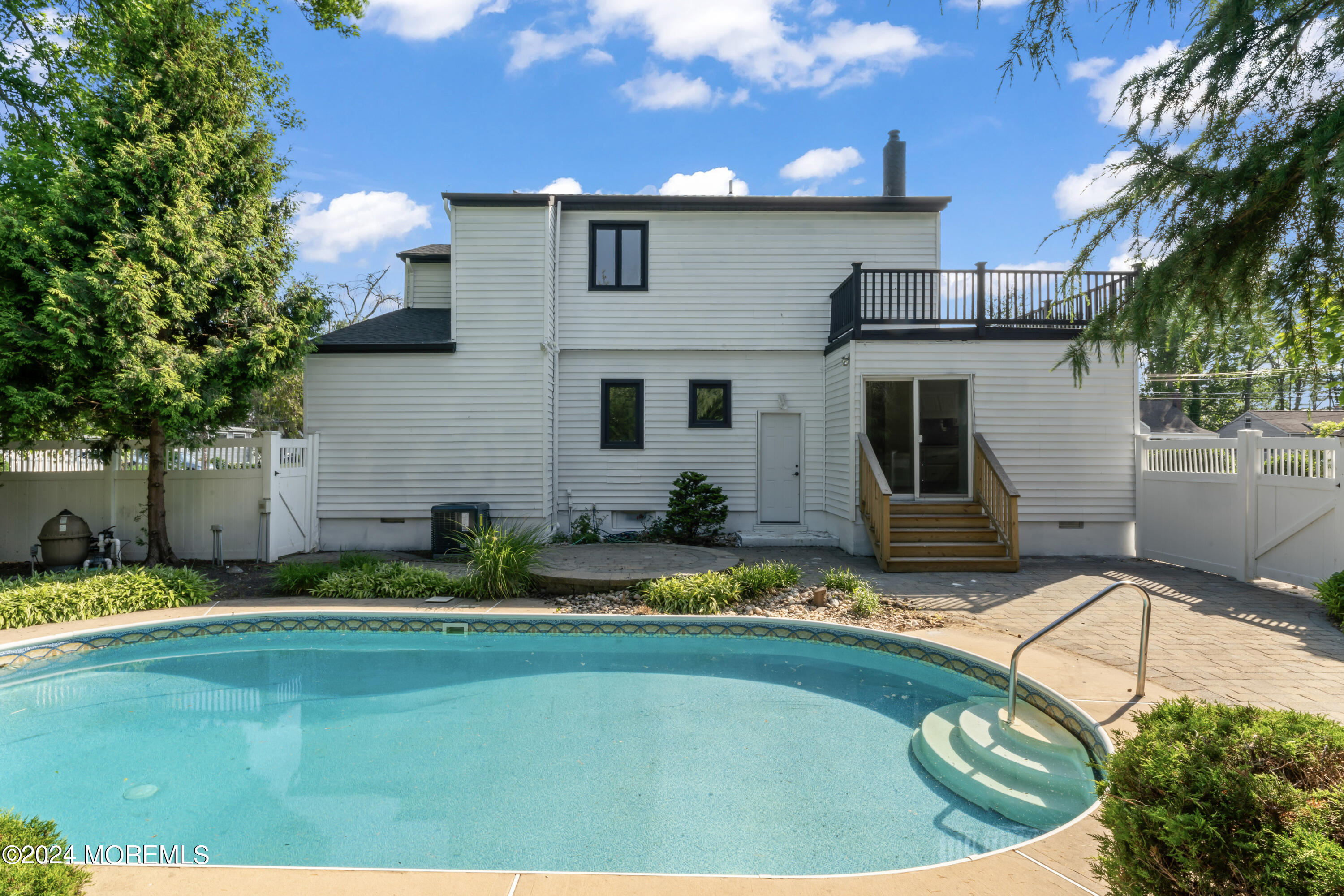 90 Riverview Avenue Neptune, NJ 07753 - Photo 25 of 31 a view of a house with swimming pool and sitting area