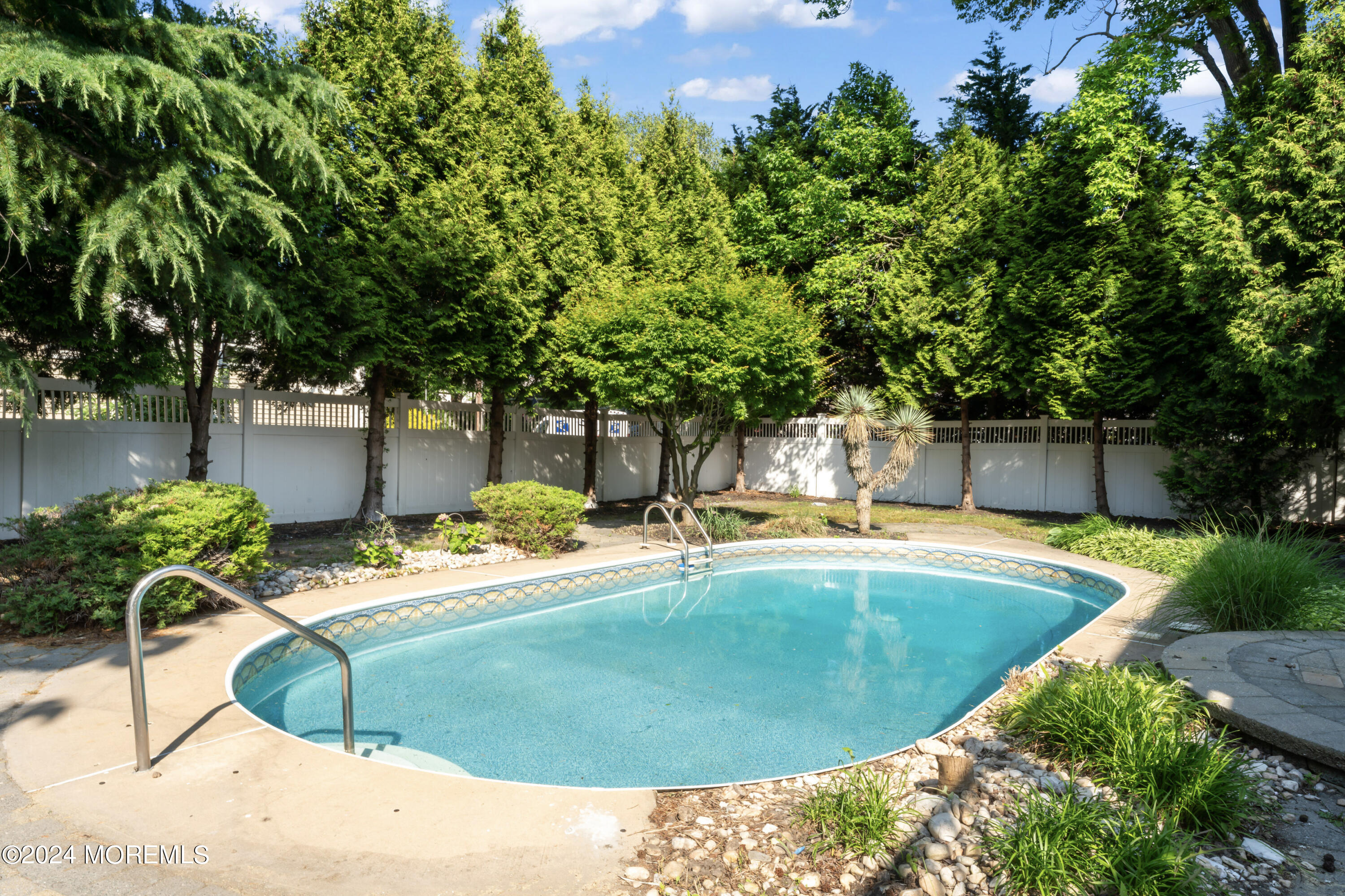 90 Riverview Avenue Neptune, NJ 07753 - Photo 26 of 31 a view of a swimming pool with a patio