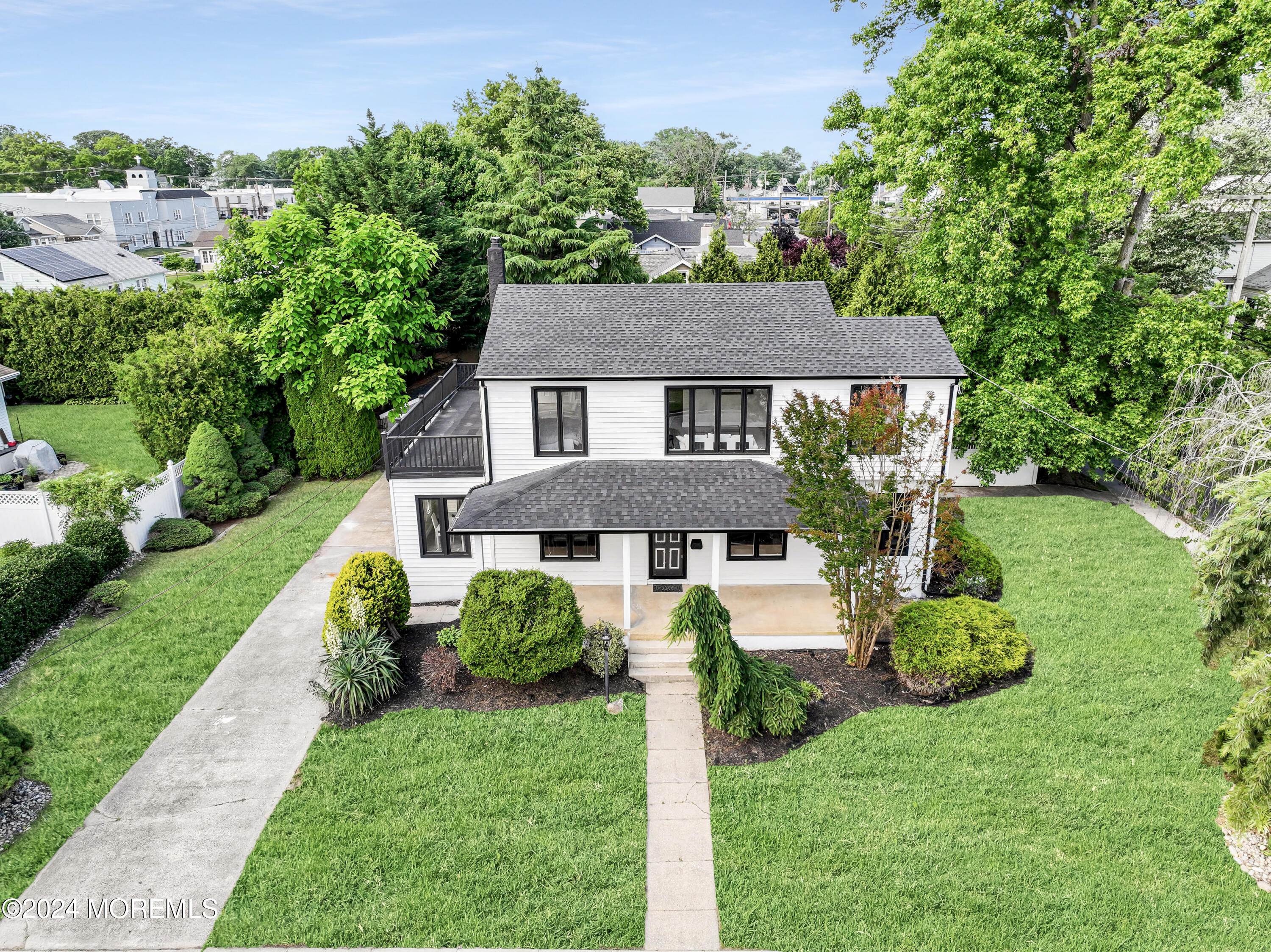 90 Riverview Avenue Neptune, NJ 07753 - Photo 3 of 31 a front view of a house with garden