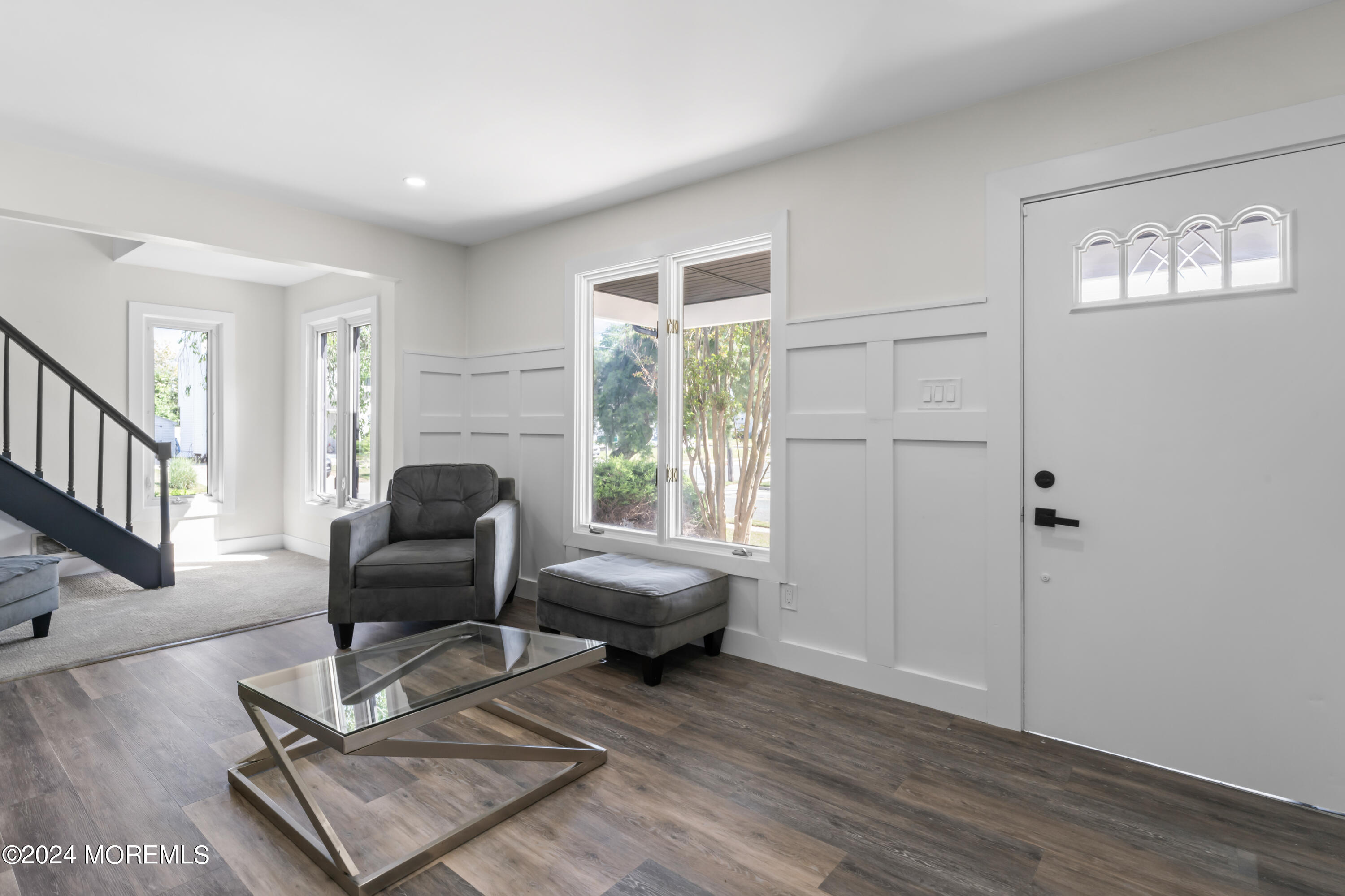 90 Riverview Avenue Neptune, NJ 07753 - Photo 5 of 31 a living room with furniture and a window