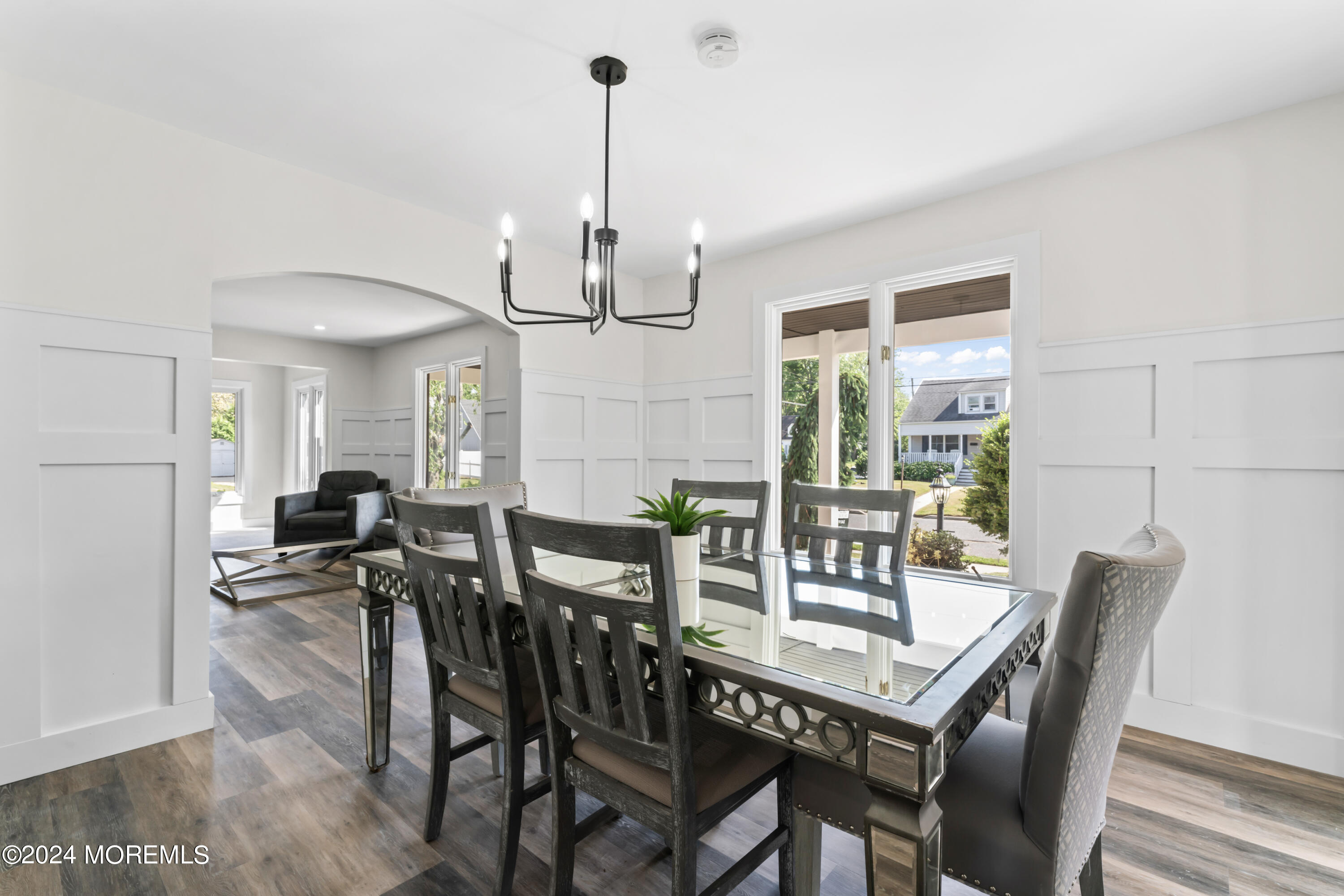90 Riverview Avenue Neptune, NJ 07753 - Photo 8 of 31 a view of a dining room with furniture window and wooden floor