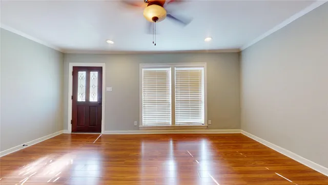 an aerial view of a house with outdoor space