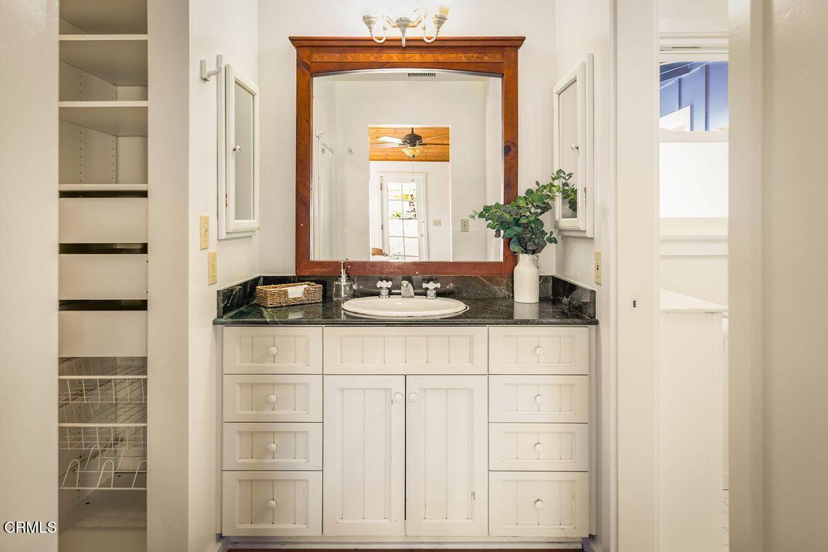 1010 Fairview Road Ojai, CA 93023 - Photo 11 of 24 a bathroom with a sink and a mirror