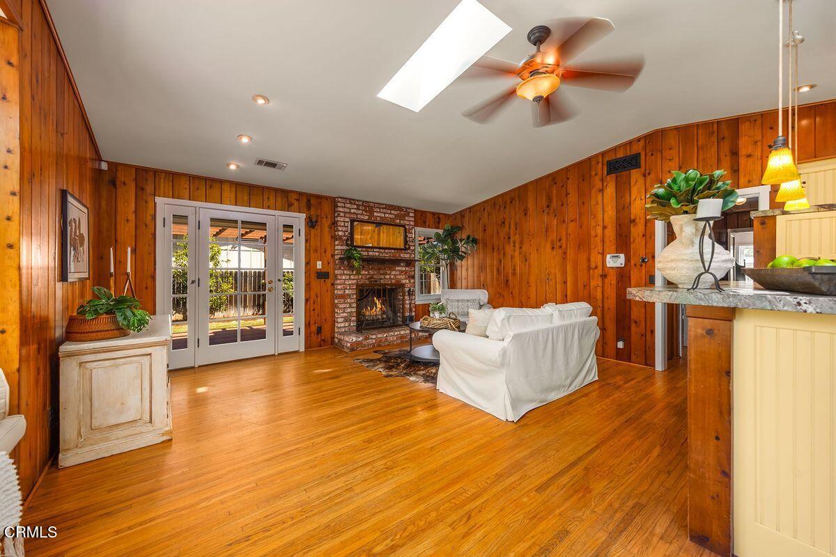 1010 Fairview Road Ojai, CA 93023 - Photo 18 of 24 a living room with fireplace furniture and a floor to ceiling window