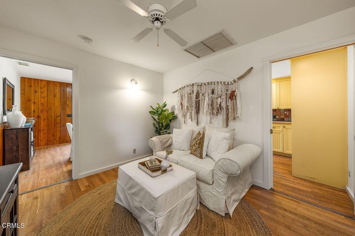1010 Fairview Road Ojai, CA 93023 - Photo 21 of 24 a living room with furniture and wooden floor