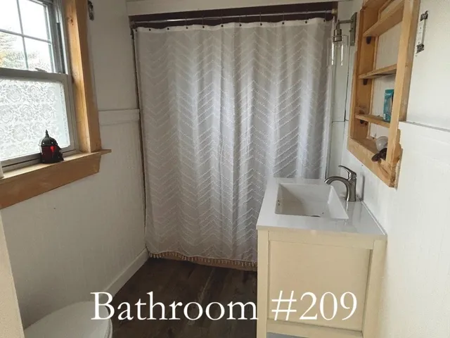 a view of a house with truck parked