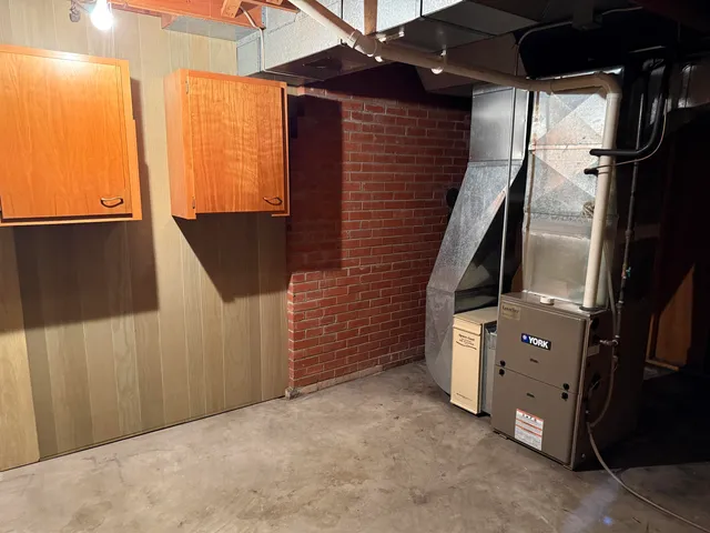 a view of an empty room with windows