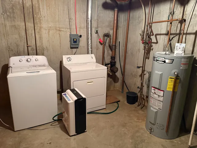 a utility room with dryer and washer