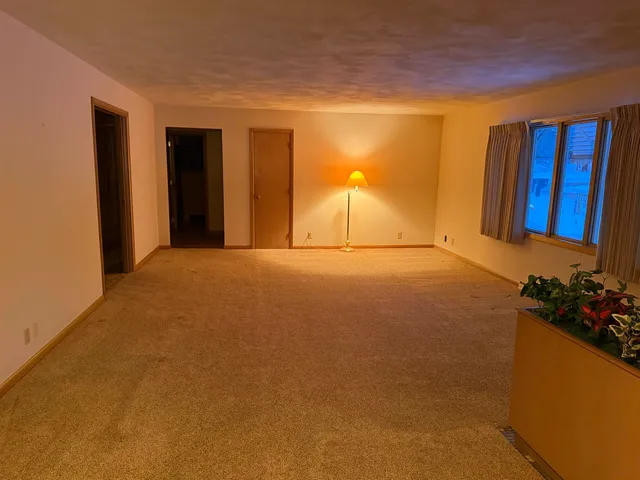 a view of a room with a window