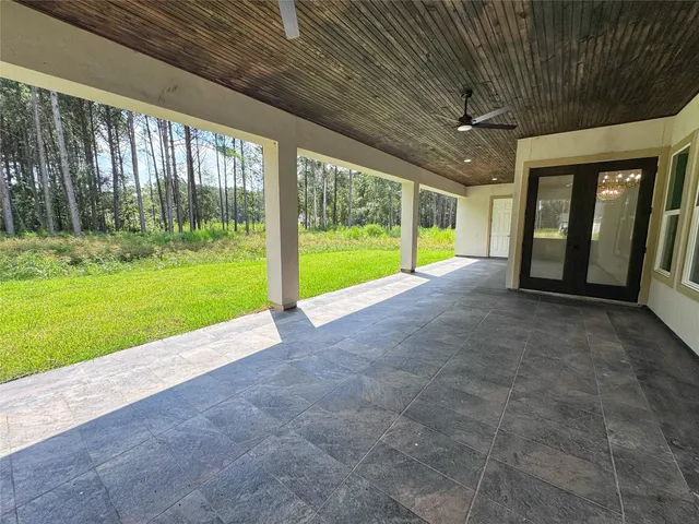 a view of an empty room with a porch
