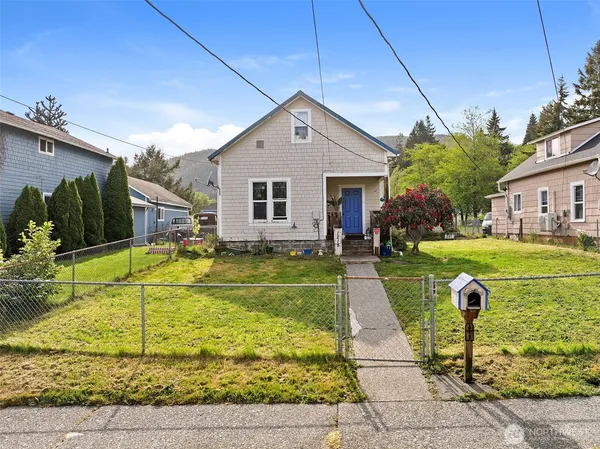a front view of house with yard