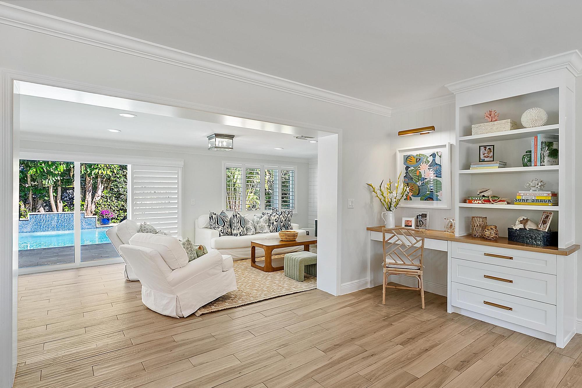 4967 Bimini Road Tequesta, FL 33469 - Photo 14 of 36 a living room with furniture and a large window