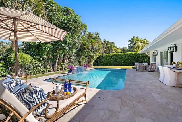 a view of a chairs and tables in the patio
