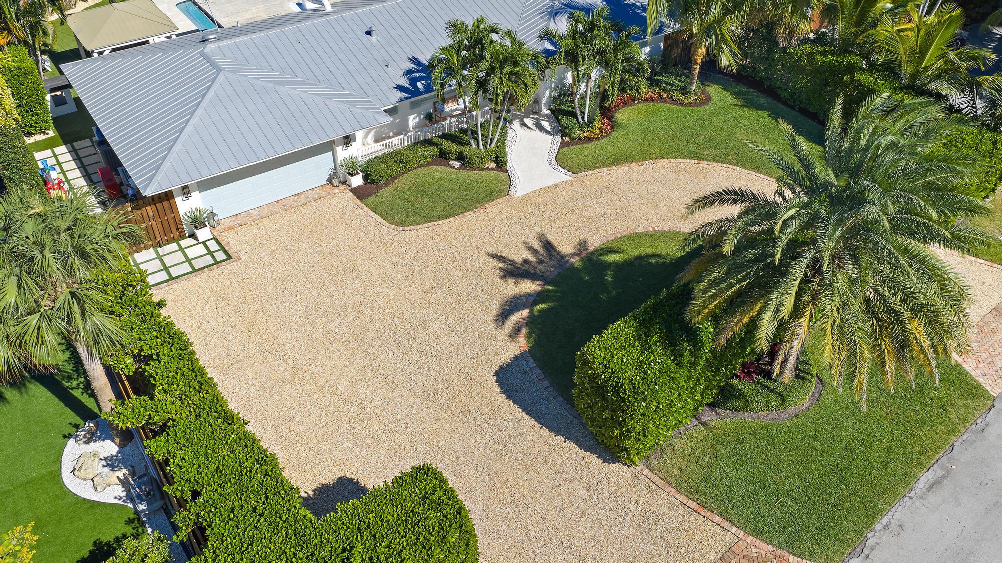 4967 Bimini Road Tequesta, FL 33469 - Photo 32 of 36 an aerial view of a house