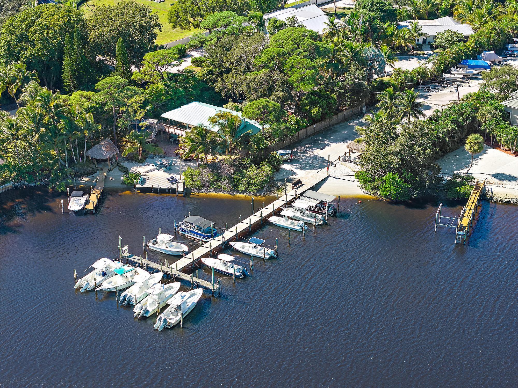 4967 Bimini Road Tequesta, FL 33469 - Photo 35 of 36 a view of a yard with patio