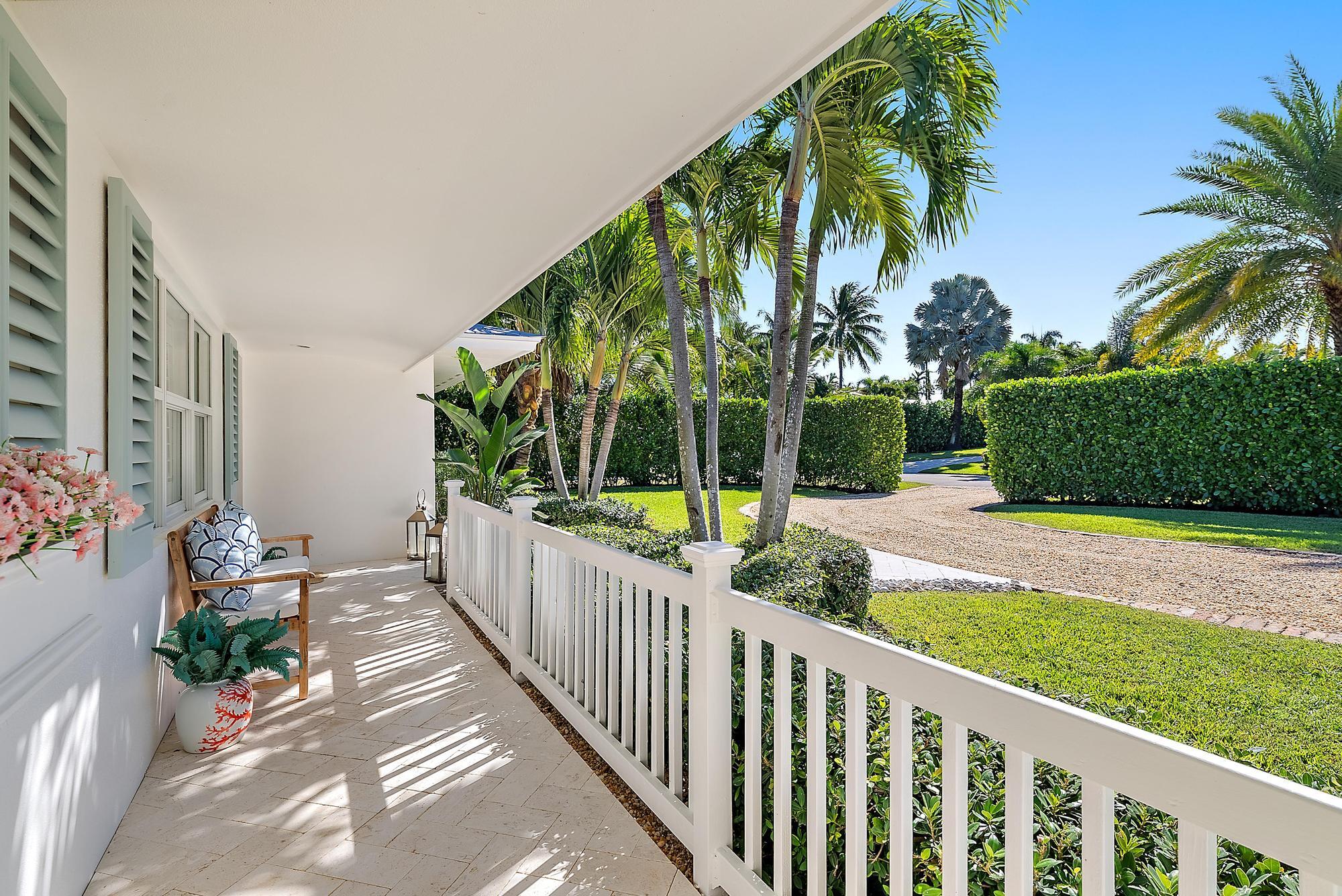 4967 Bimini Road Tequesta, FL 33469 - Photo 6 of 36 a view of a house with a yard