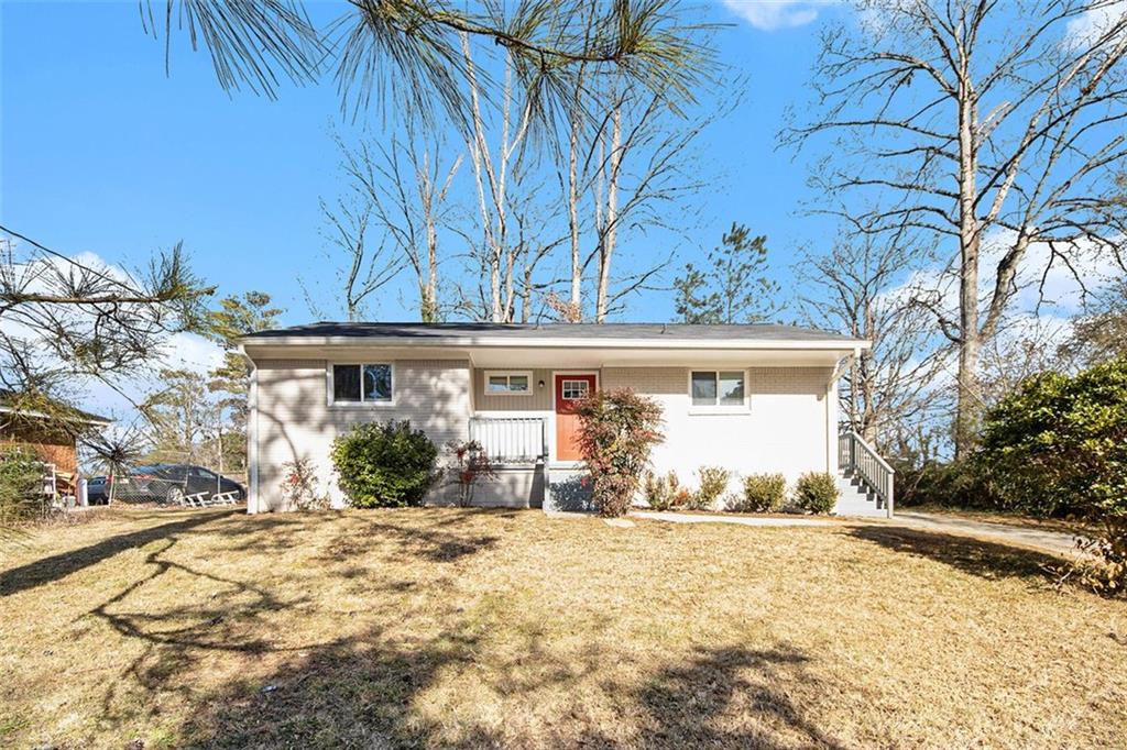 front view of a house with a yard