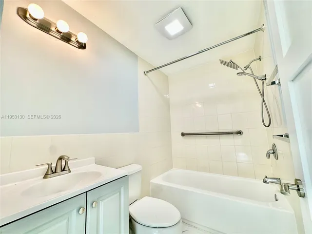 a view of a big room with wooden floor