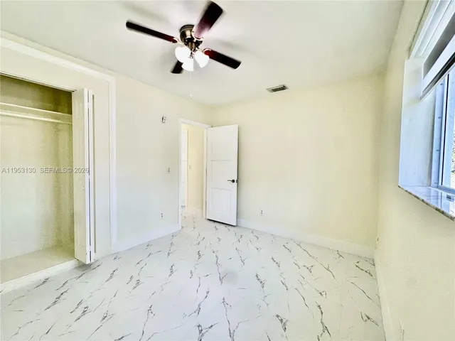 a bathroom with a sink a mirror and shower