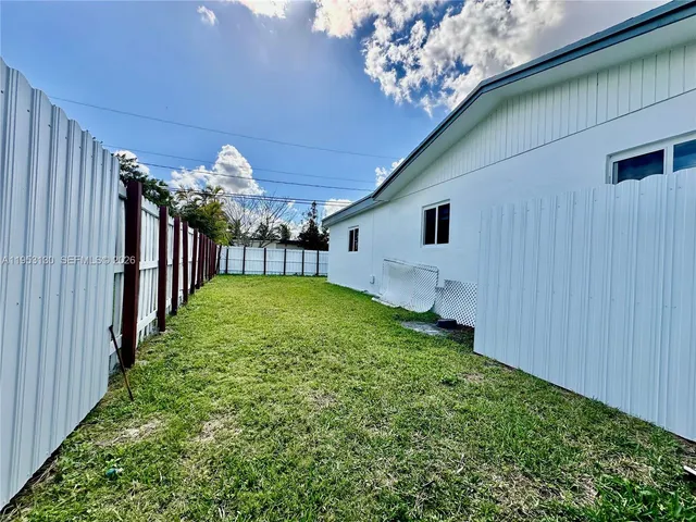 a view of a living room with a rug