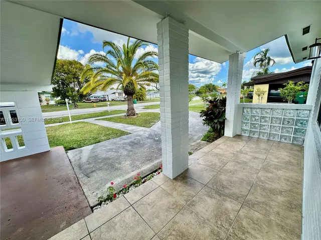 a view of outdoor space stove and kitchen view