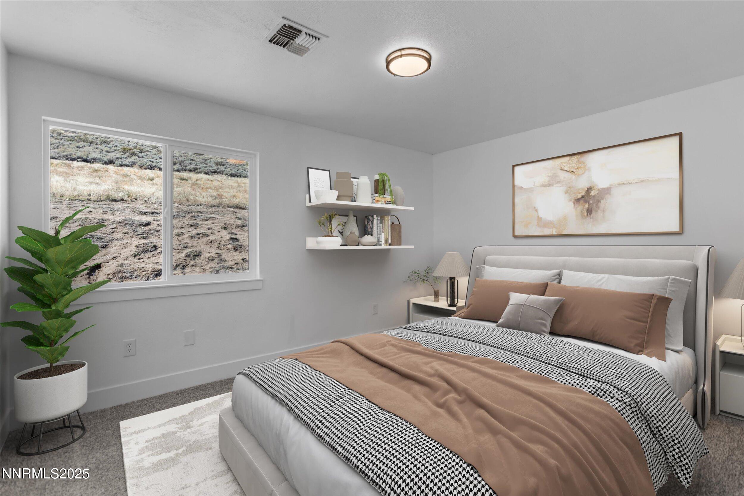 15205 North Red Rock Road Reno, NV 89508 - Photo 11 of 23 a bedroom with a large bed and a potted plant