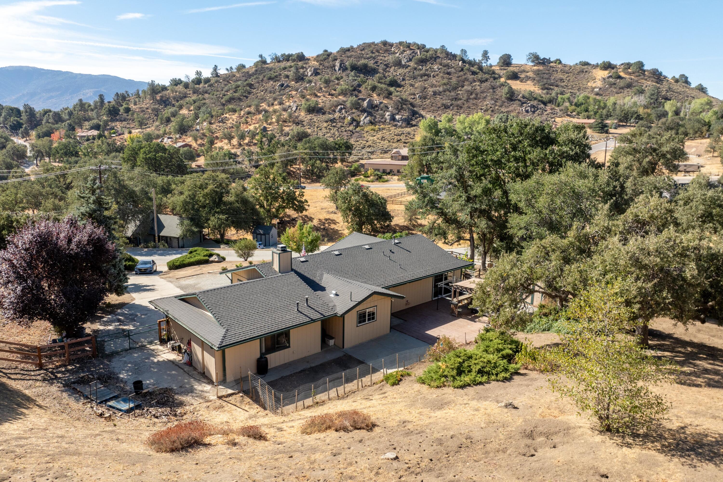 25801 Cumberland Road Tehachapi, CA 93561 - Photo 24 of 35 an aerial view of a house with a yard basket ball court and outdoor seating