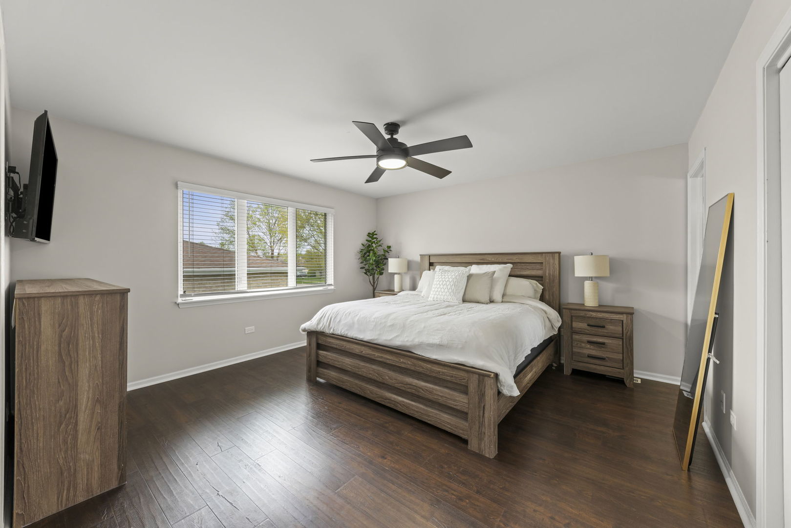 16505 Timberview Drive Plainfield, IL 60586 - Photo 12 of 29 a bedroom with a bed and a window