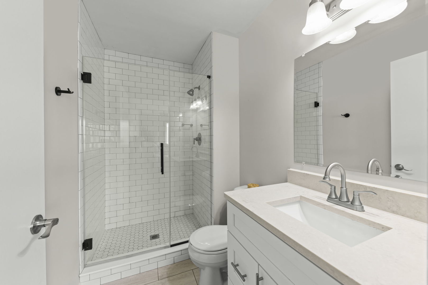 16505 Timberview Drive Plainfield, IL 60586 - Photo 14 of 29 a bathroom with a sink toilet and shower