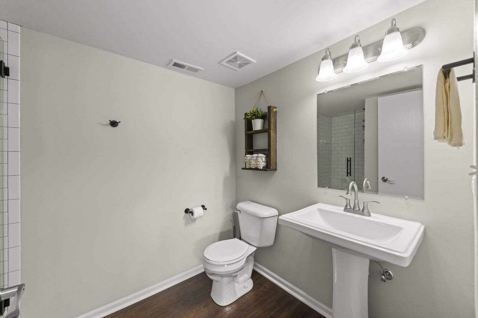 16505 Timberview Drive Plainfield, IL 60586 - Photo 20 of 29 a bathroom with a toilet sink and mirror