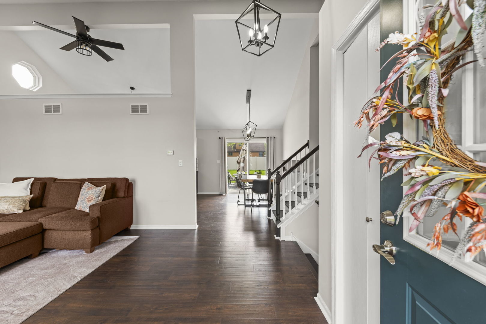 16505 Timberview Drive Plainfield, IL 60586 - Photo 3 of 29 a living room with furniture and a wooden floor