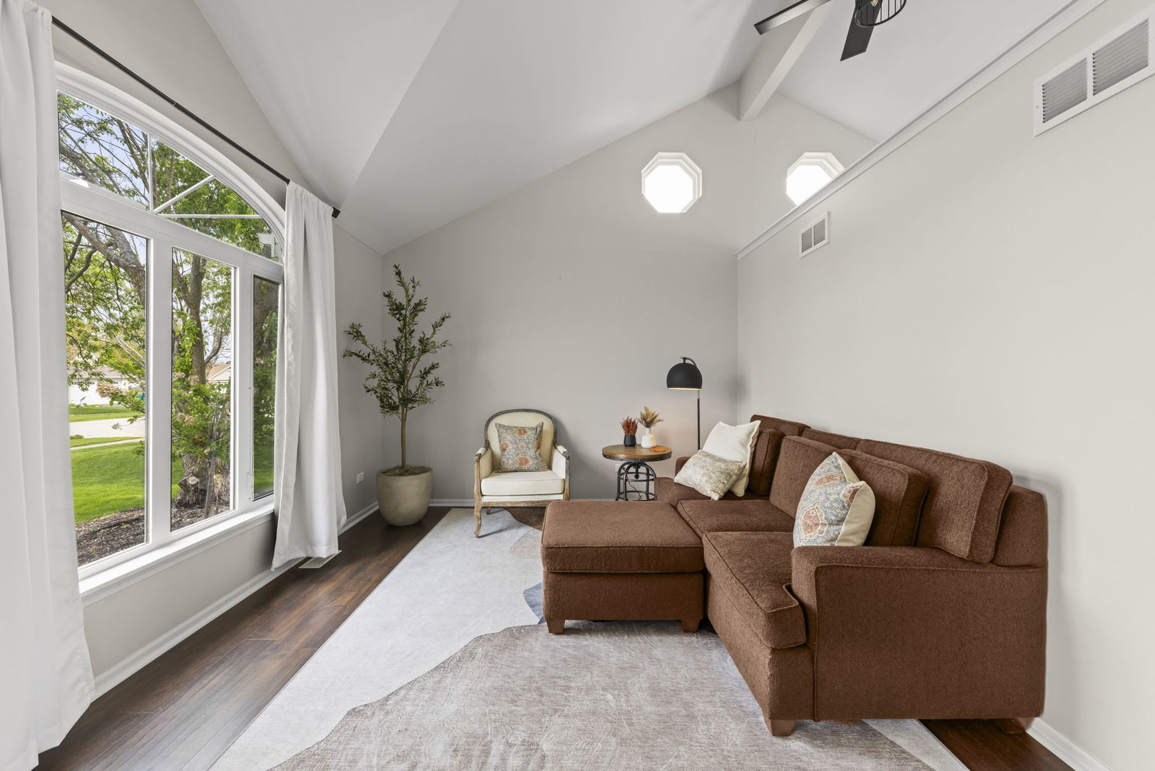 16505 Timberview Drive Plainfield, IL 60586 - Photo 5 of 29 a living room with furniture and a large window