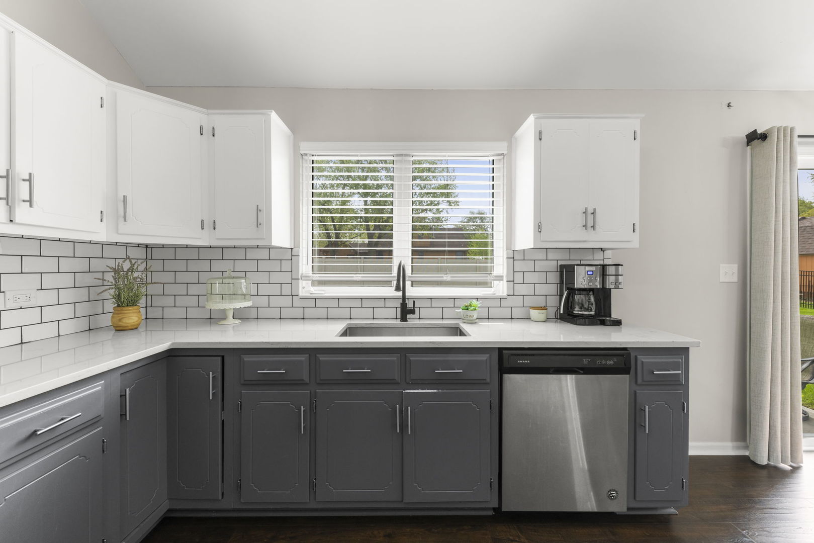 16505 Timberview Drive Plainfield, IL 60586 - Photo 10 of 29 a kitchen with stainless steel appliances granite countertop a sink and a window