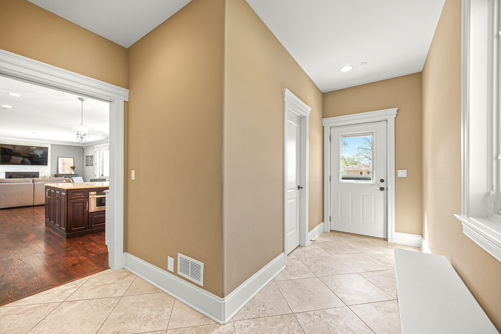 915 Forestview Road Addison, IL 60101 - Photo 16 of 49 a view of a hallway with kitchen and dining room view