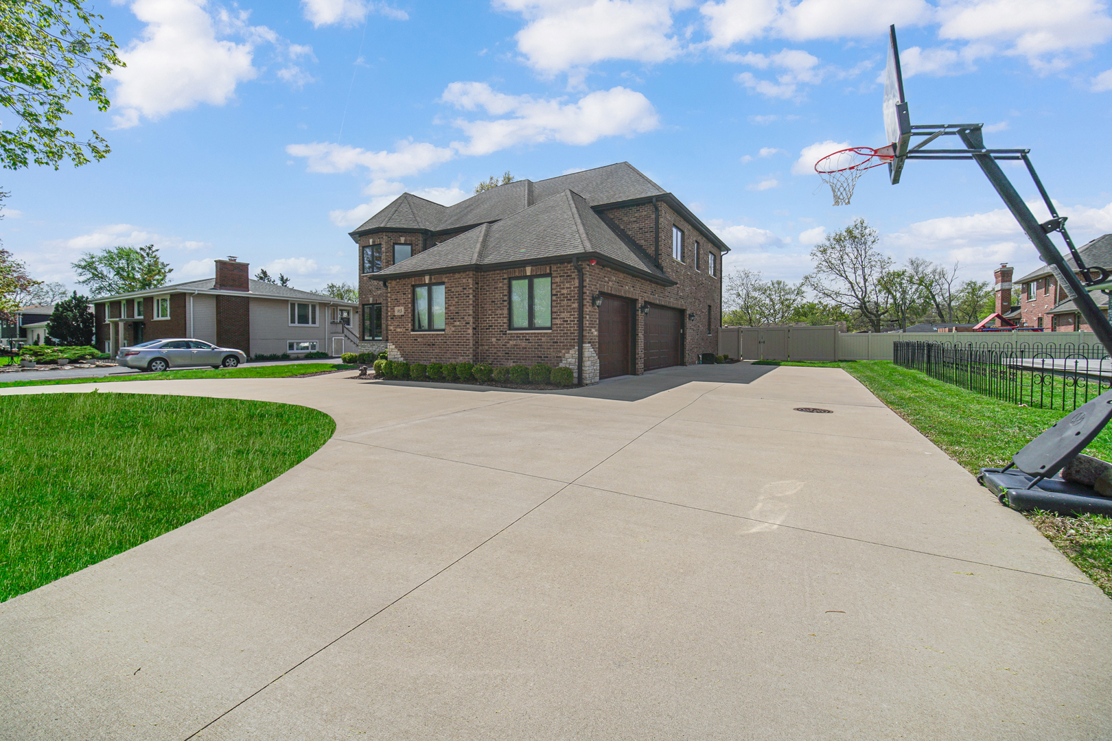 915 Forestview Road Addison, IL 60101 - Photo 2 of 49 a front view of a house with a yard and garage