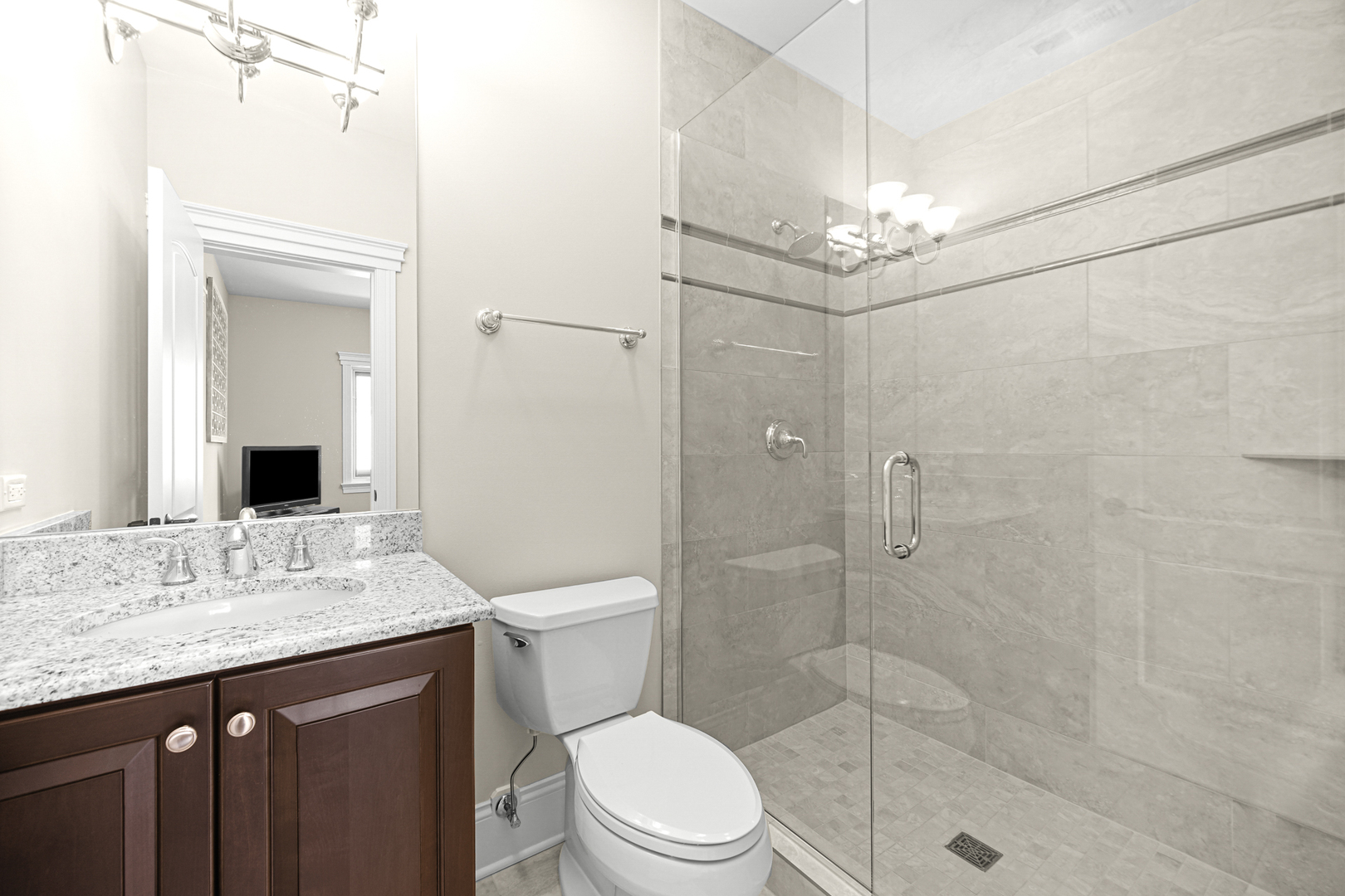 915 Forestview Road Addison, IL 60101 - Photo 24 of 49 a bathroom with a sink a toilet and shower