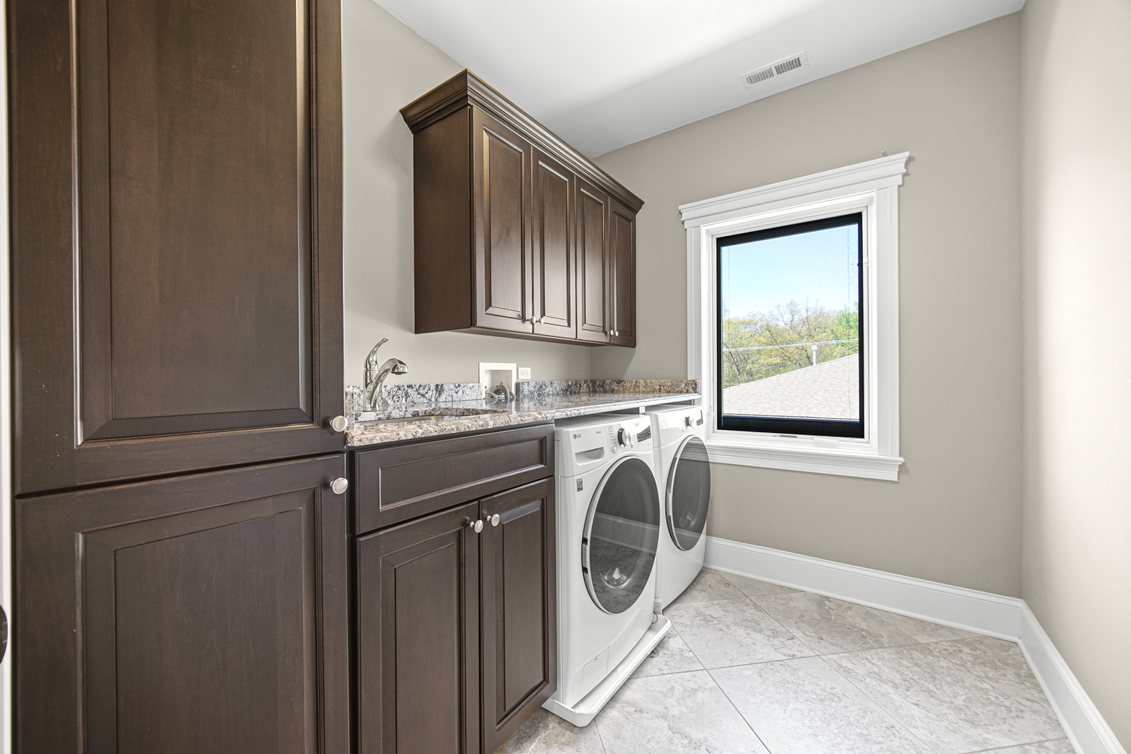 915 Forestview Road Addison, IL 60101 - Photo 25 of 49 a utility room with dryer and washer