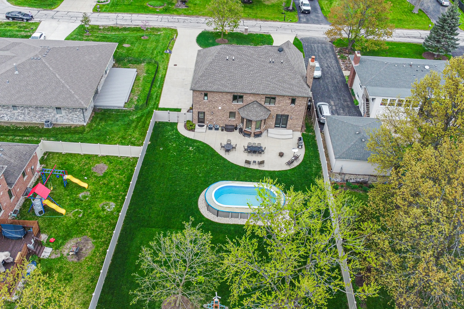 915 Forestview Road Addison, IL 60101 - Photo 3 of 49 an aerial view of a house with a garden and trees