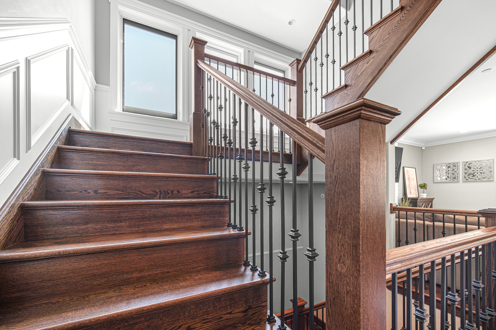 915 Forestview Road Addison, IL 60101 - Photo 33 of 49 a view of staircase with lots of frames on wall and a window