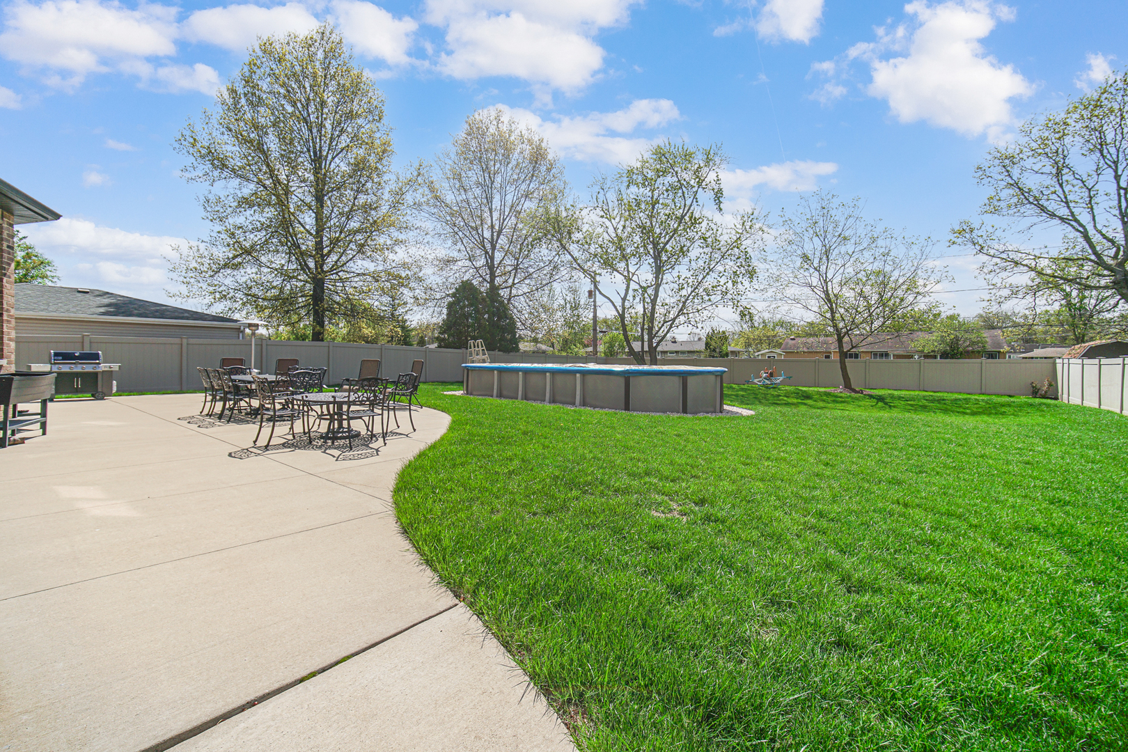 915 Forestview Road Addison, IL 60101 - Photo 39 of 49 a view of a backyard with sitting area