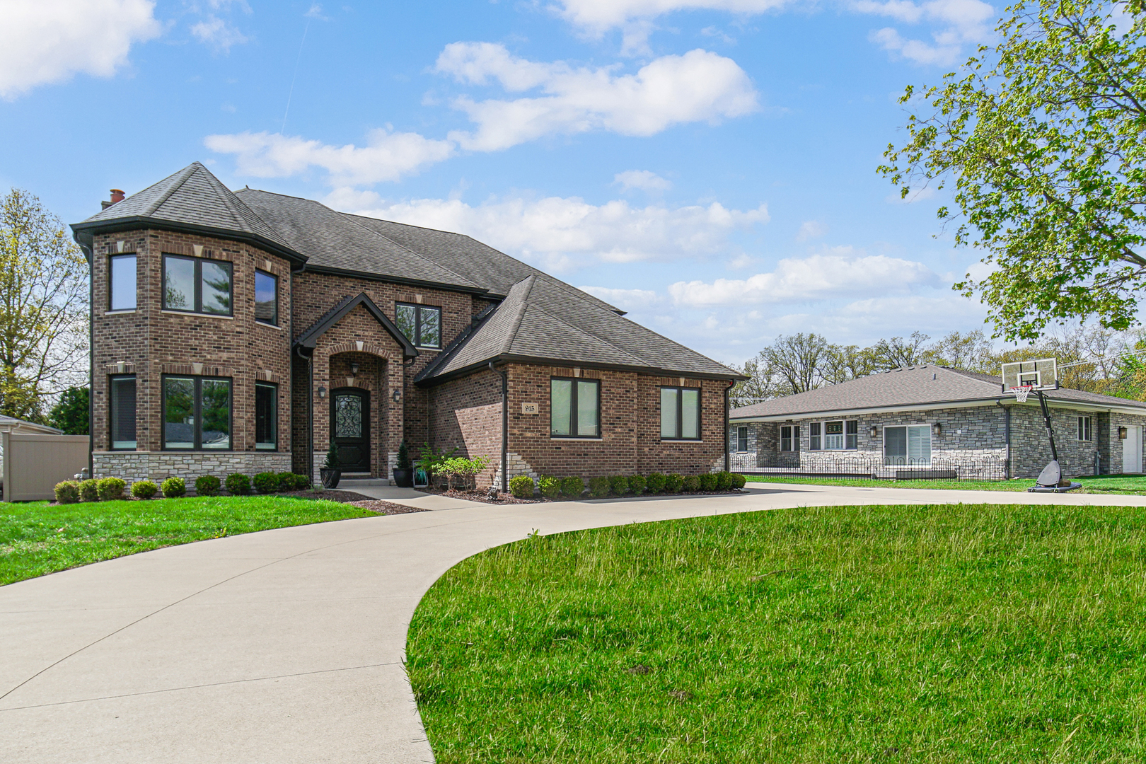 915 Forestview Road Addison, IL 60101 - Photo 44 of 49 a front view of a house with a yard and trees