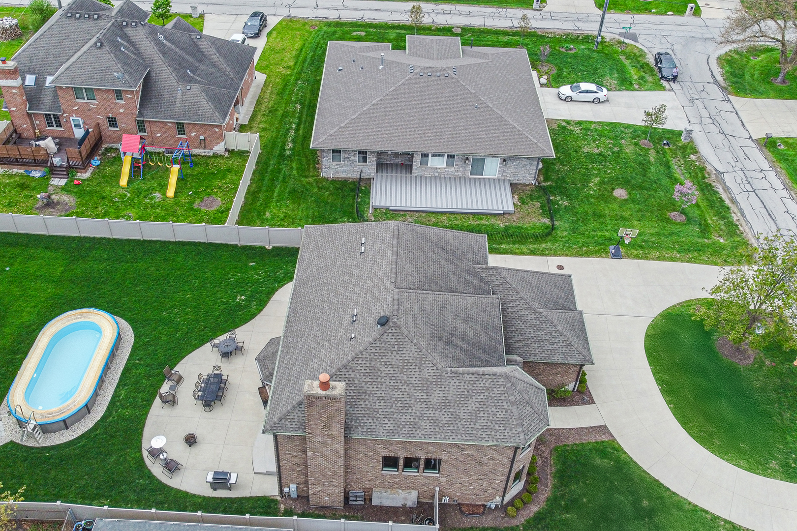 915 Forestview Road Addison, IL 60101 - Photo 48 of 49 an aerial view of a house with swimming pool and yard