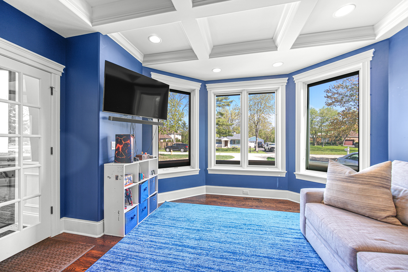 915 Forestview Road Addison, IL 60101 - Photo 6 of 49 a living room with fireplace furniture and a flat screen tv