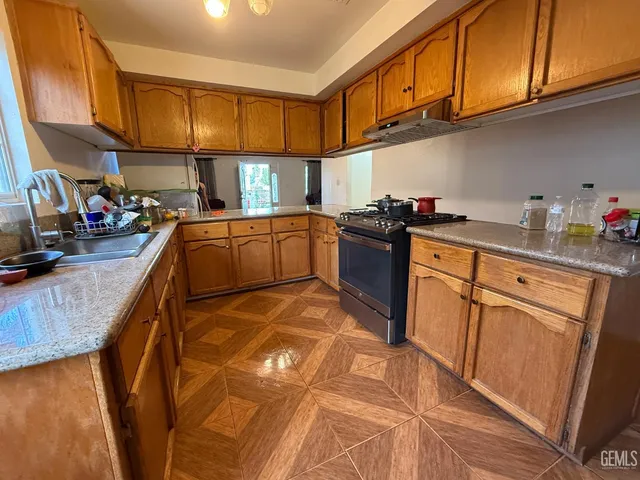 a bathroom with a sink a mirror and a bathtub