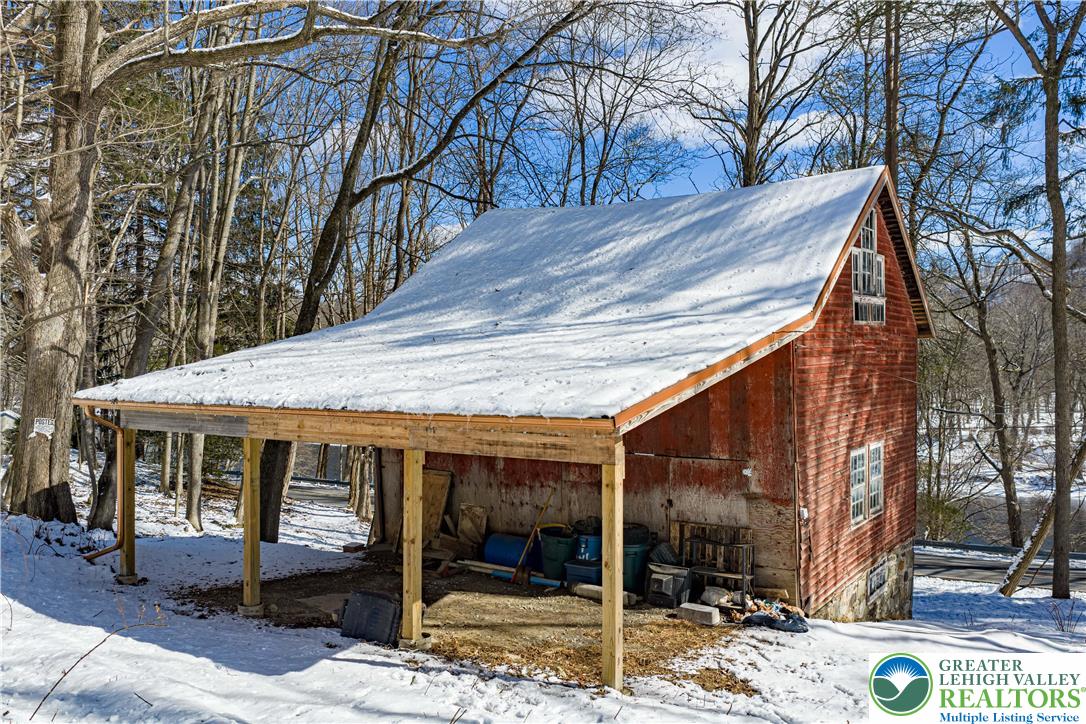 2058 River Road Mount Bethel, PA 18343 - Photo 16 of 39 a view of a house with a yard