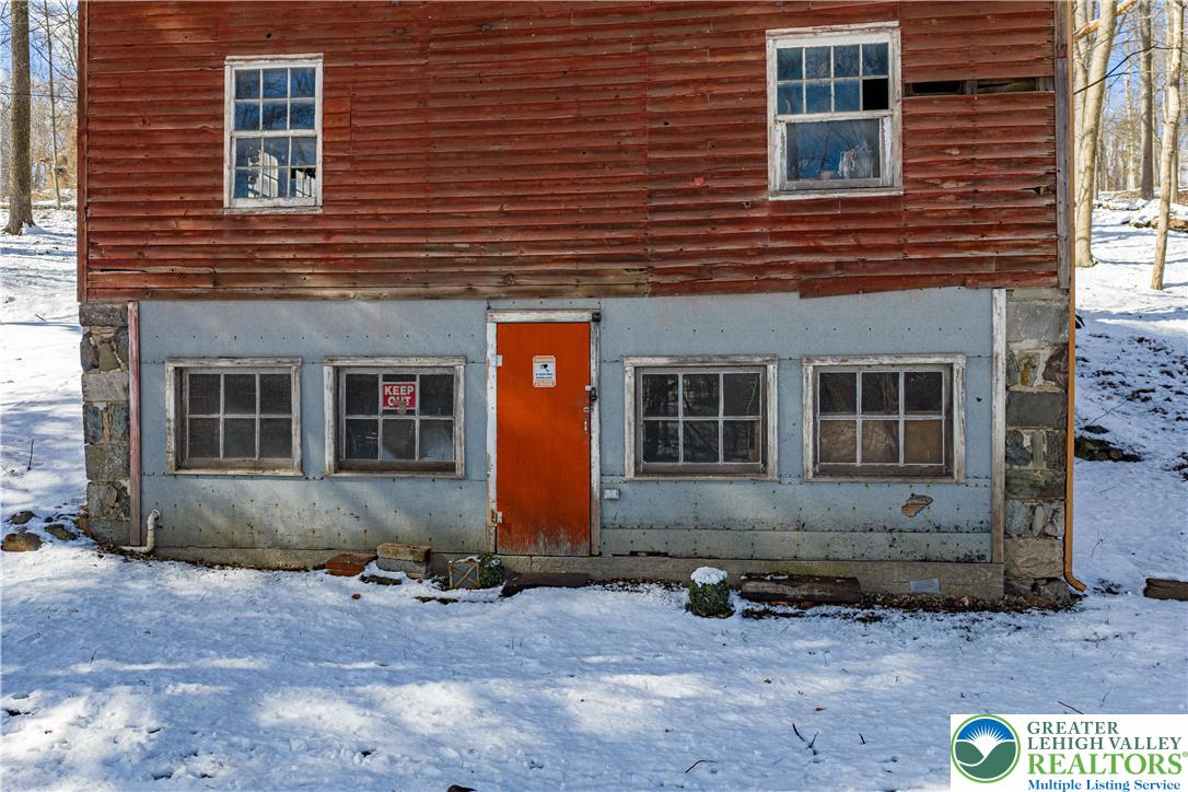 2058 River Road Mount Bethel, PA 18343 - Photo 18 of 39 a front view of a house with a yard