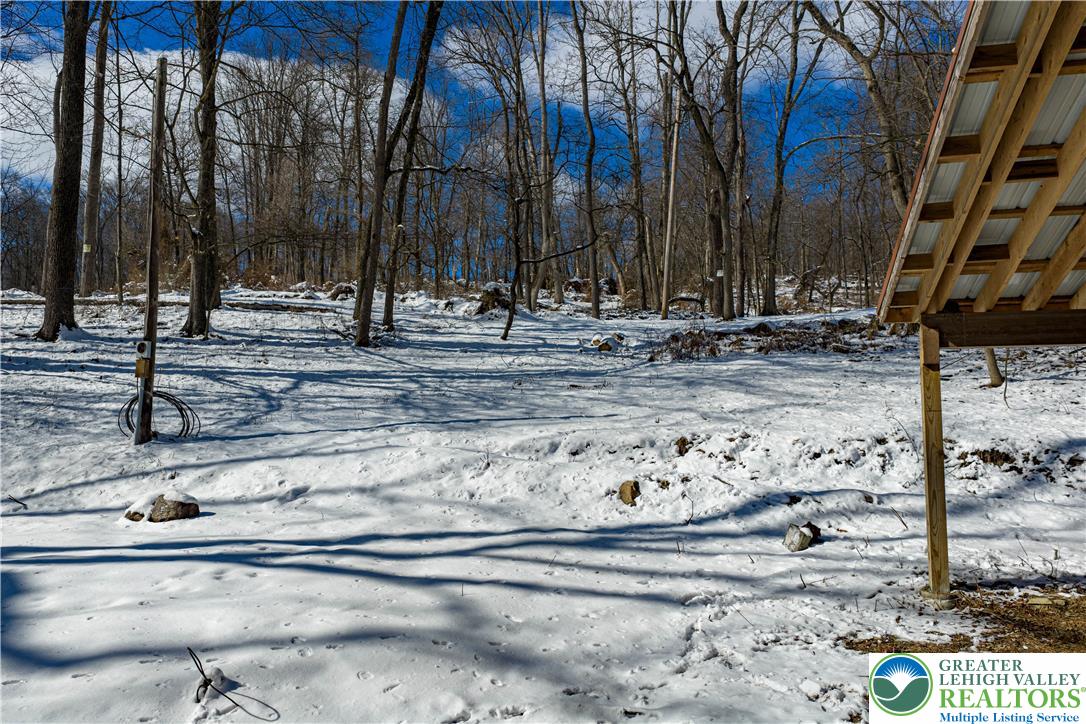 2058 River Road Mount Bethel, PA 18343 - Photo 22 of 39 a view of a backyard of the house