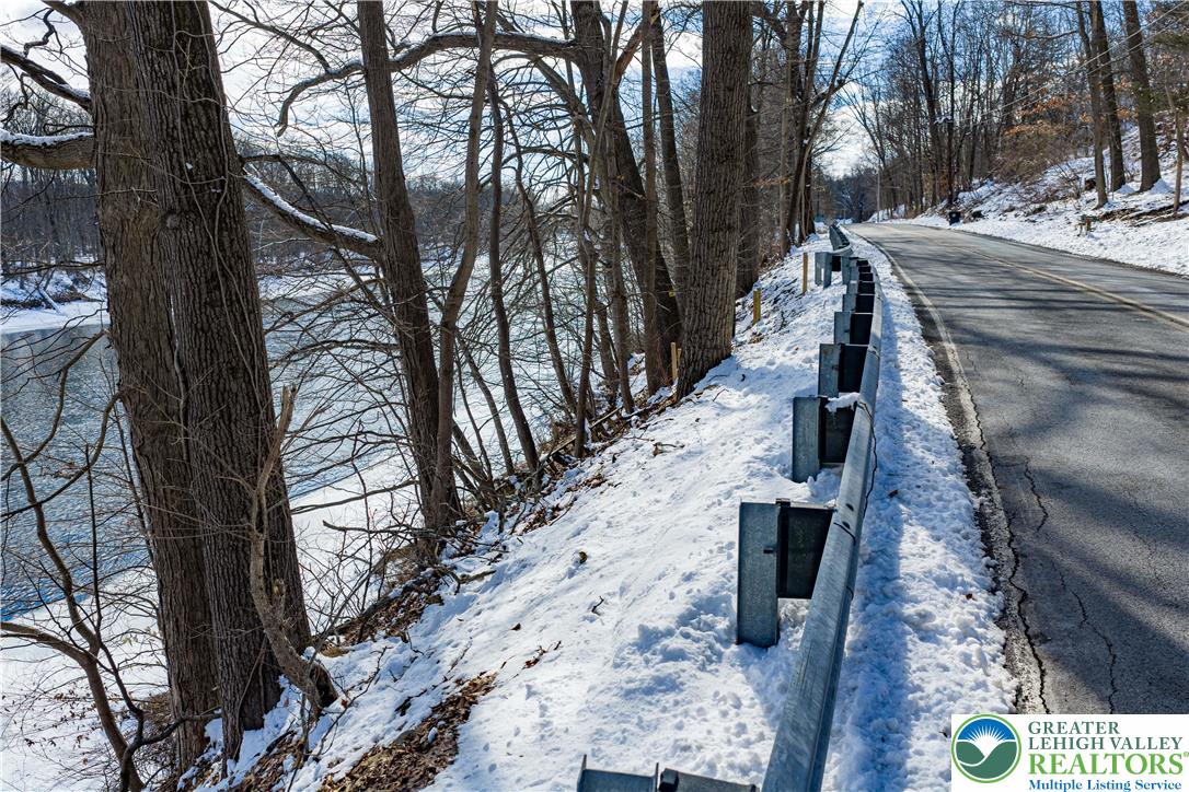 2058 River Road Mount Bethel, PA 18343 - Photo 26 of 39 a view of a pathway with a tree